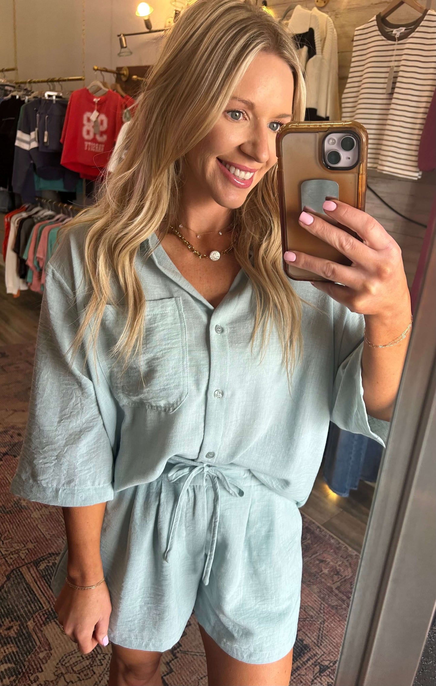 Model wearing Linen Breeze 2pc Mint Set featuring dolman sleeve top and drawstring shorts, perfect for summer style.