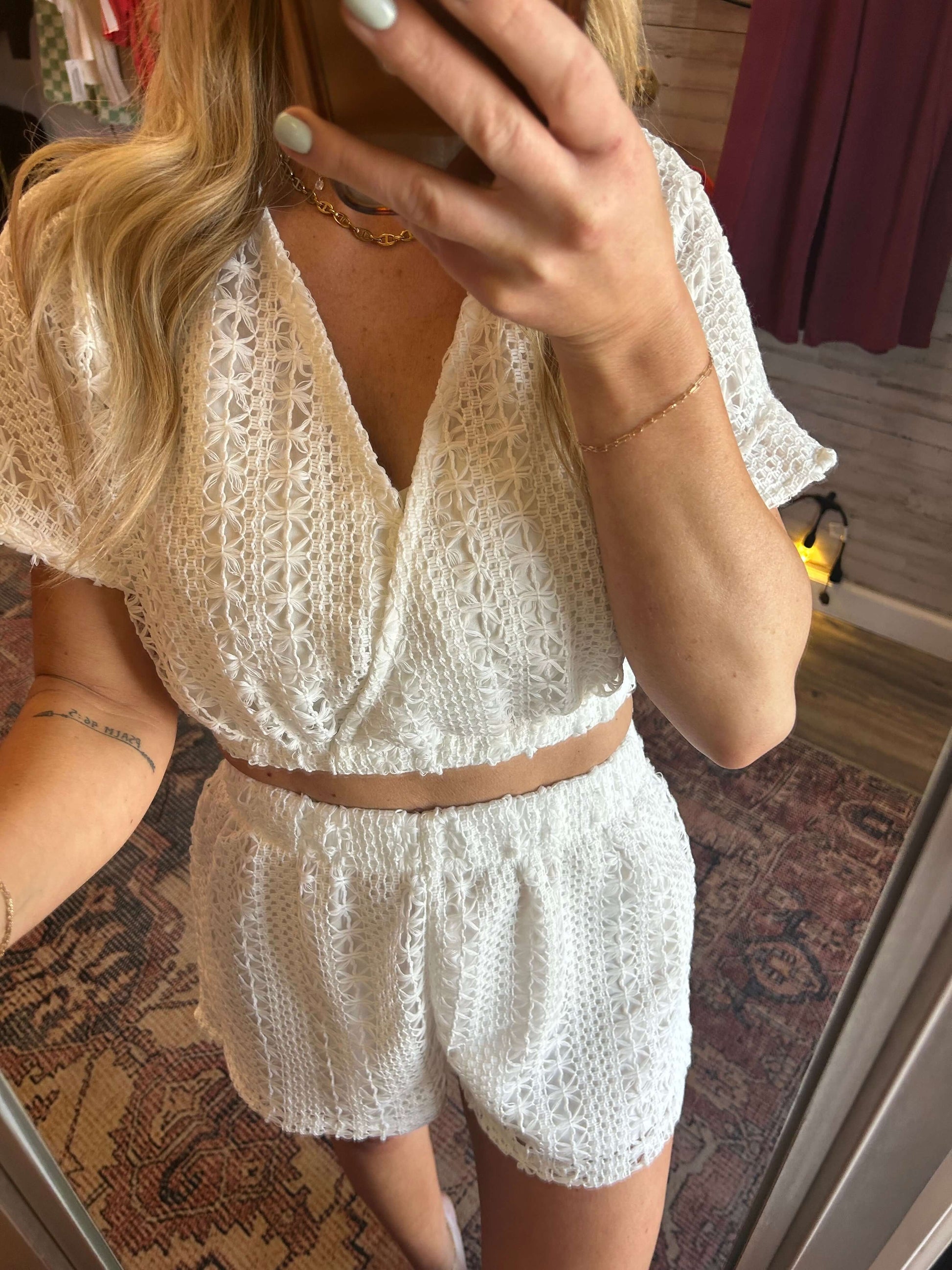 Summer Lovin Crochet 2pc Set in white, featuring a crochet crop top and shorts, perfect for vacation styling.