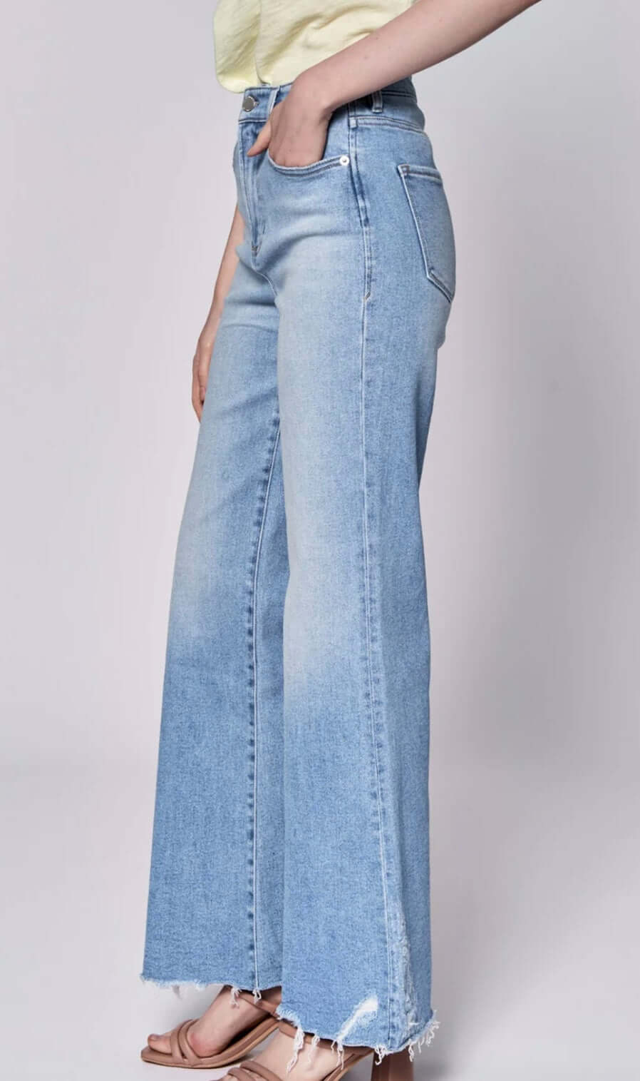 Fiona high rise full inseam jeans in light blue with frayed hem, perfect blend of style and comfort.