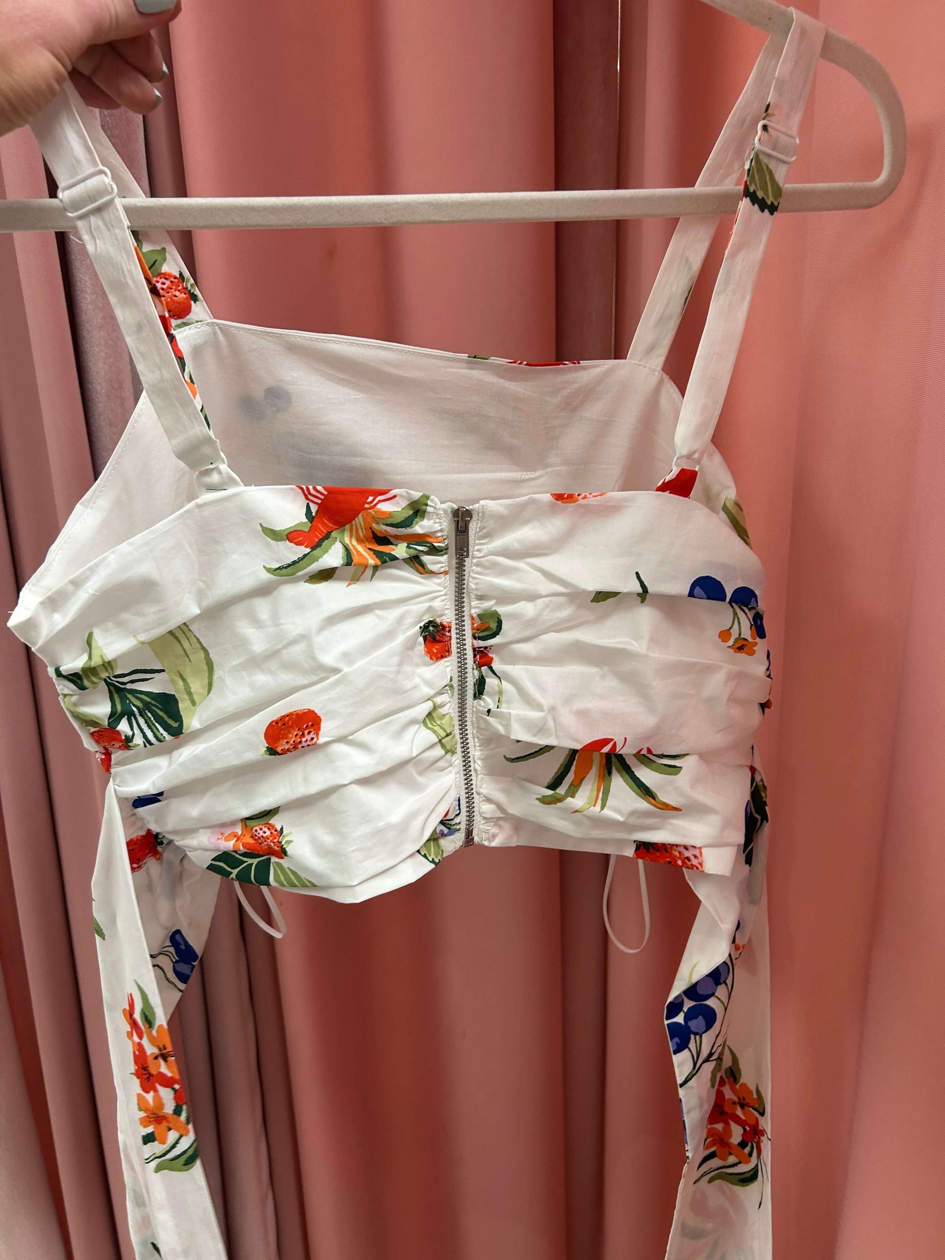 Floral crop top from Sweet Summer 2pc skirt set, featuring adjustable straps and a stylish zip back, perfect for summer.