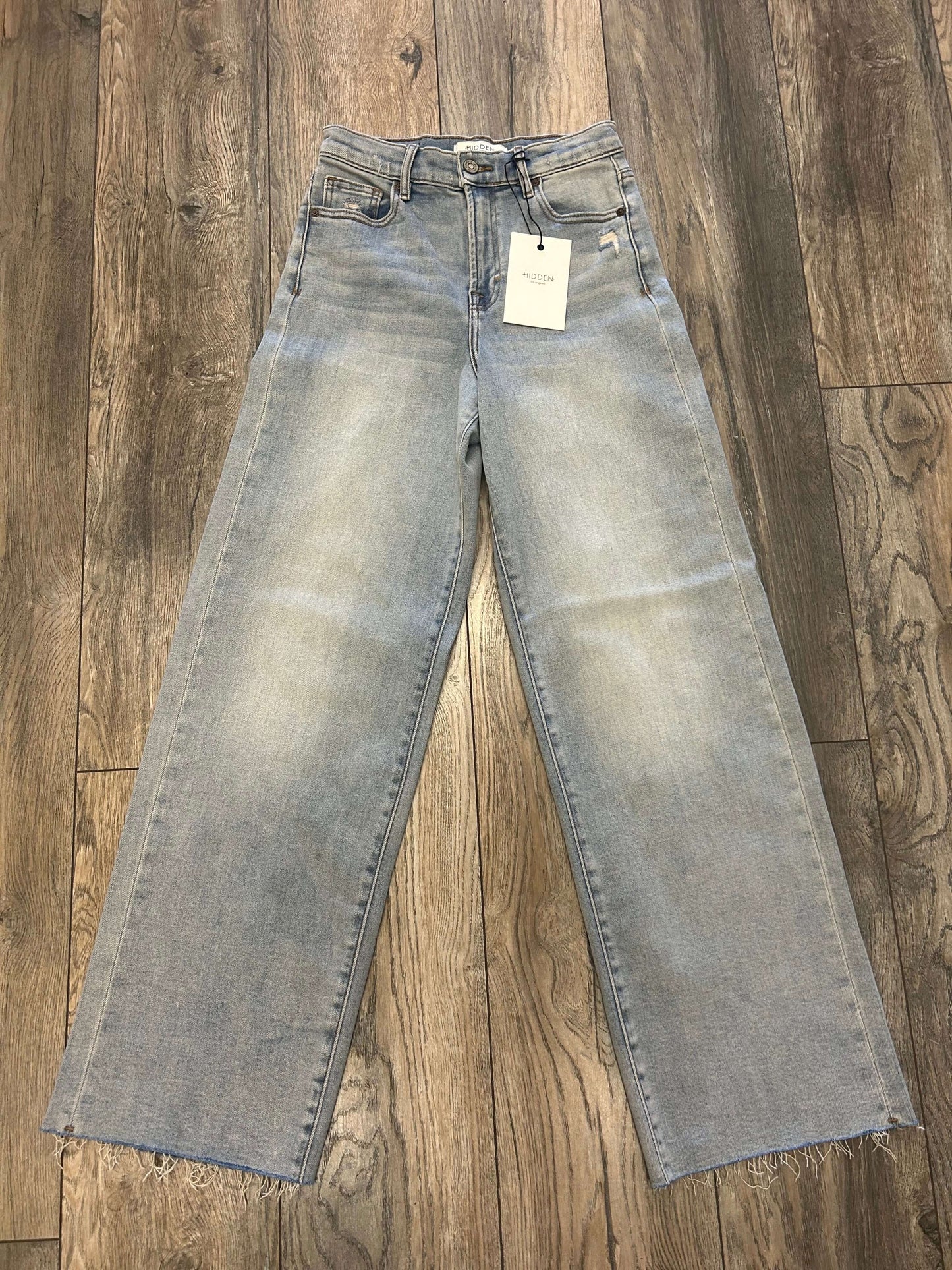 HIDDEN Logan Highrise Dad Jeans in light wash, featuring wide leg and raw hem design, ideal for spring and summer styles.