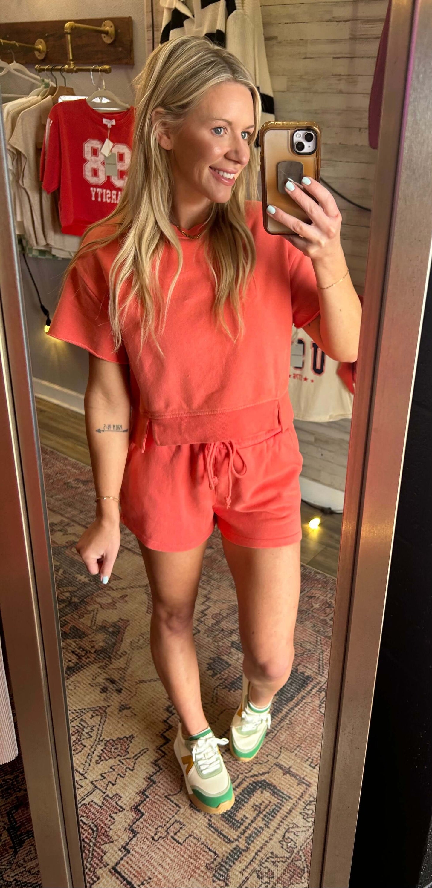 Summer sunset coral 2pc short set for women, featuring a cozy top and drawstring shorts with pockets.