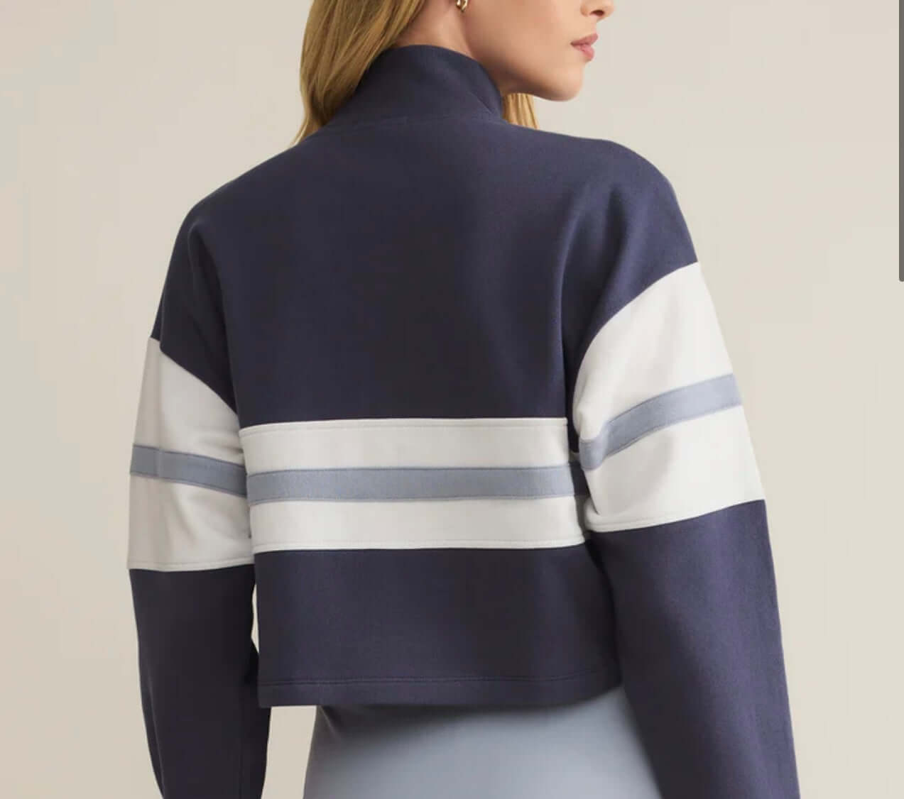Back view of Z Supply All Day Rugby Sweatshirt in navy with white and gray stripes, showcasing its cropped design.