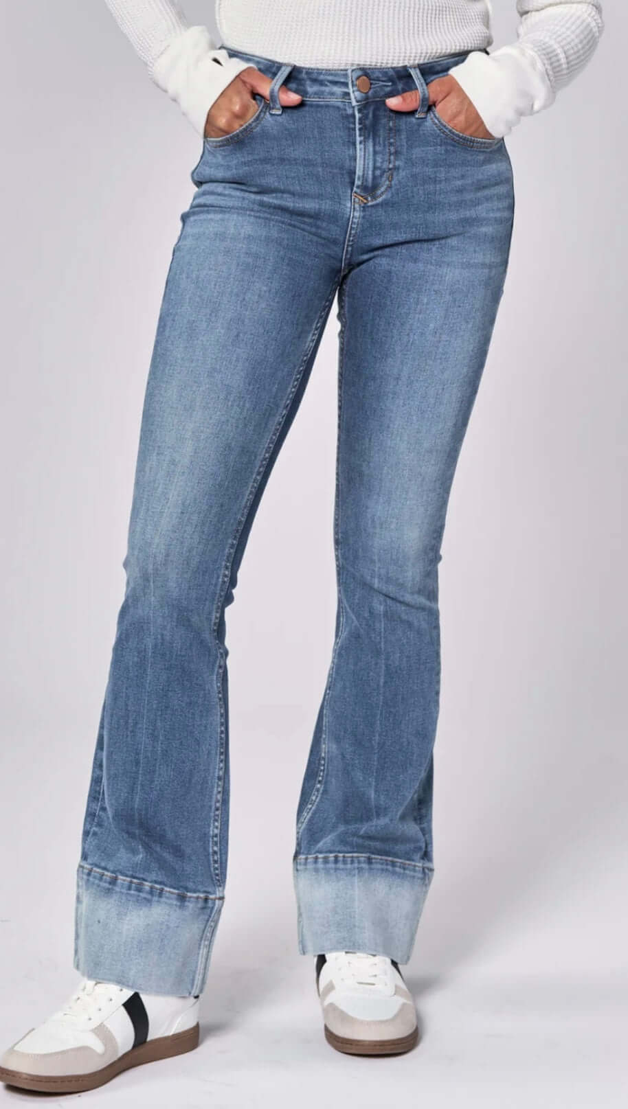 Dear John Jaxtyn midrise bootcut jeans in lagoon with cuffed hem, styled for comfort and trend.