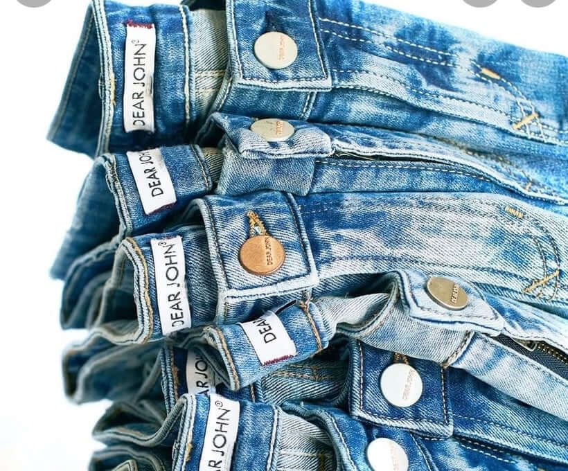 A stack of Dear John Denim jeans showcasing their quality and stylish design, perfect for everyday wear.